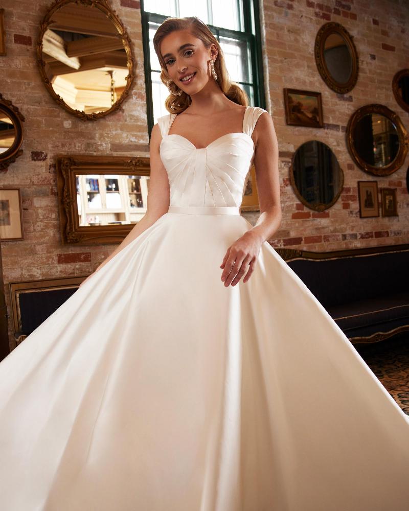 La22233 satin ball gown wedding dress with pockets and buttons down the train4